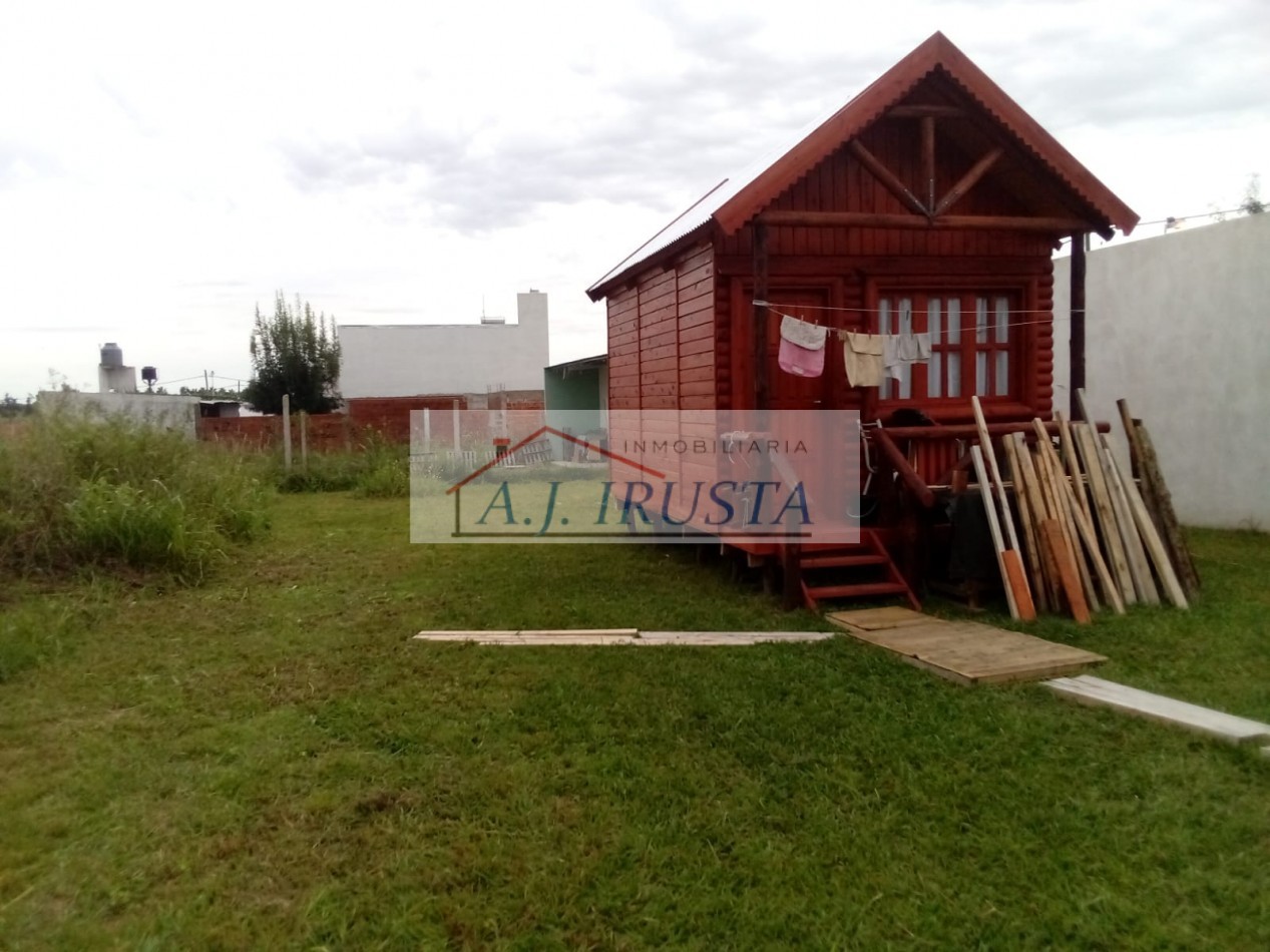 TERRENO CON CABAÑA DE MADERA