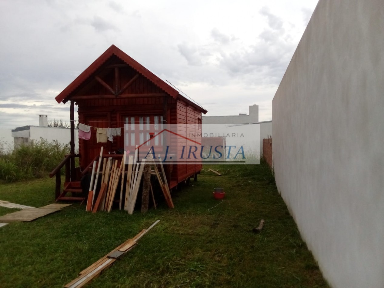 TERRENO CON CABAÑA DE MADERA